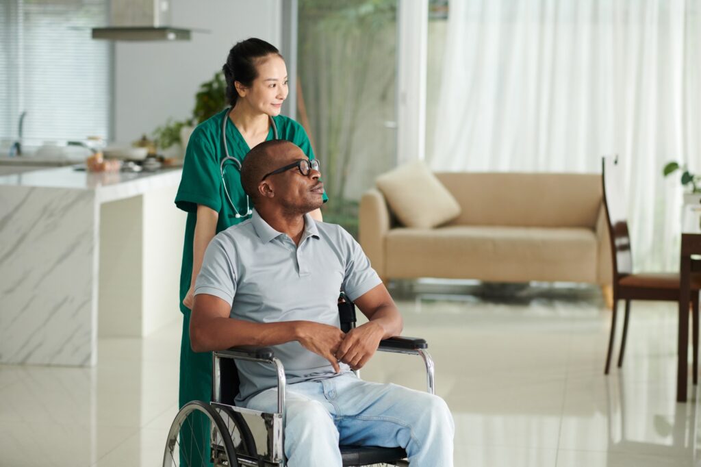 Caregiver Pushing Wheelchair